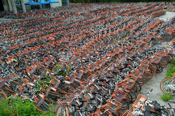 Bicycles of Chinese bike-sharing service Mobike are lined up in Shenzhen city, south China's Guangdong province, on July 13, 2017. [Photo: Imagine China]