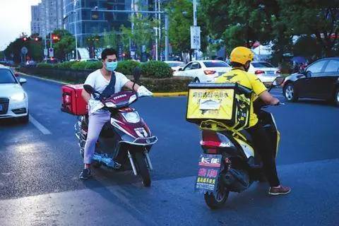 Food delivery firms are being told to increase traffic safety management of their couriers. [Photo: Xinhua Daily Telegraph]