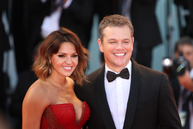 Actor Matt Damon and his wife Luciana Barroso arrive on the red carpet of the premiere of the film "Downsizing" which opens the 74th edition of the Venice Film Festival in Venice, August 30, 2017. [Photo: AP/Domenico Stinellis]