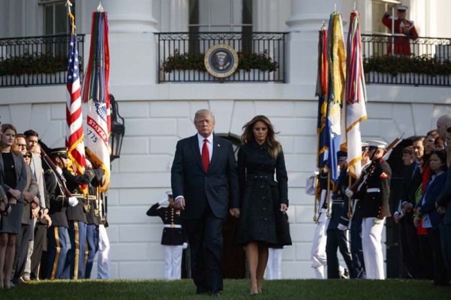 President Donald Trump and first lady Melania Trump arrive for a ceremony to mark the anniversary of the Sept. 11 terrorist attacks, on the South Lawn of the White House, Monday, Sept. 11, 2017, in Washington. [Photo: AP]
