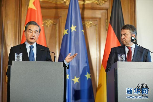 Chinese Foreign Minister Wang Yi and his German counterpart, Sigmar Gabriel, meet the press in Berlin, Germany, April 26, 2017. [File Photo: Xinhua]