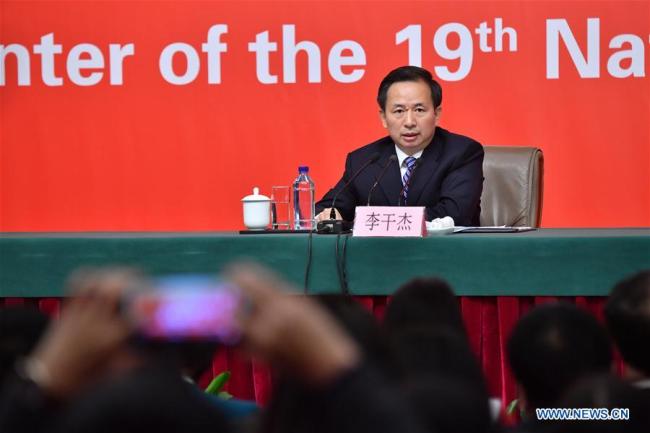 Chinese Minister of Environmental Protection Li Ganjie speaks at a press conference held by the press center of the 19th National Congress of the Communist Party of China (CPC) in Beijing, capital of China, Oct. 23, 2017. The press conference was themed on pursuing green development and building beautiful China. [Photo: Xinhua/Li Xin]