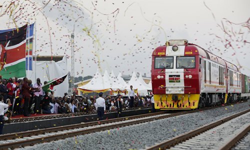 People celebrate the opening of the Mombasa-Nairobi Standard Gauge Railway in Mombasa, Kenya in May 2017. [Photo: IC]