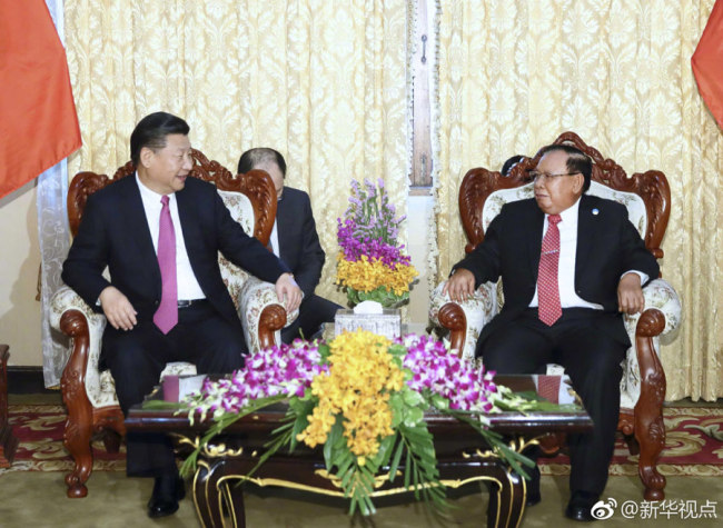 Chinese President Xi Jinping (L), also general secretary of the Communist Party of China Central Committee, holds talks with Bounnhang Vorachit, general secretary of the Lao People's Revolutionary Party (LPRP) Central Committee and president of Laos, in Vientiane, Laos, Nov. 13, 2017. [Photo: Xinhua/Lan Hongguang]