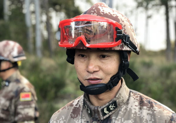 Squad Leader Li Huaihong talks to media after China-US joint drills on humanitarian relief and disaster rescue in Seaside of Oregon on November 18th 2017, local time. [Photo: China Plus/Liu Kun]