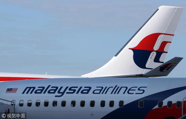 The Malaysian Airlines System Berhad (MAS) logo is displayed on the company's aircraft at Kuala Lumpur International Airport (KLIA) in Sepang, Malaysia, Jan. 31, 2013. [File Photo: VCG]