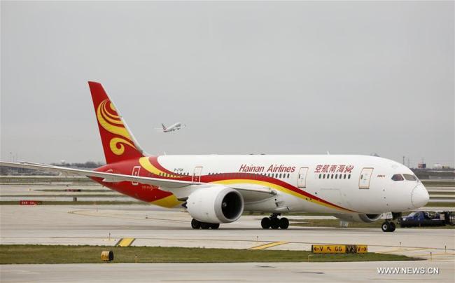 China's Hainan Airlines Flight arrives at O'Hare International Airport in Chicago, the United States, on Nov. 21, 2017. [Photo: Xinhua]