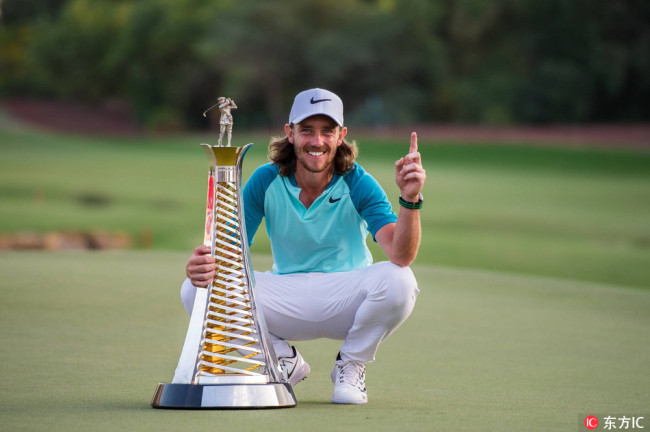 Tommy Fleetwood of England poses with the Race to Dubai trophy after the European Tour DP World Championship WM Weltmeisterschaft at Jumeirah Golf Estates, Dubai, UAE on 19 November 2017. [Photo: IC]