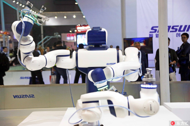 A robot is on display at the 19th China International Industry Fair 2017 in Shanghai, China, 7 November 2017. [Photo: IC]