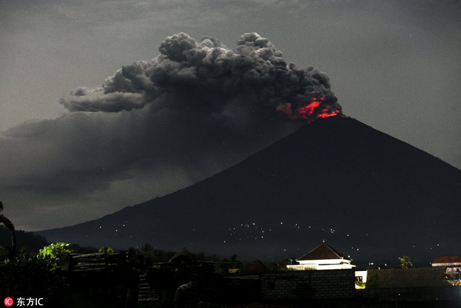 Mount Agung volcano spewing hot volcanic ash seen from Amed in Karangasem, Bali, Indonesia, 28 November 2017. [Photo: IC]