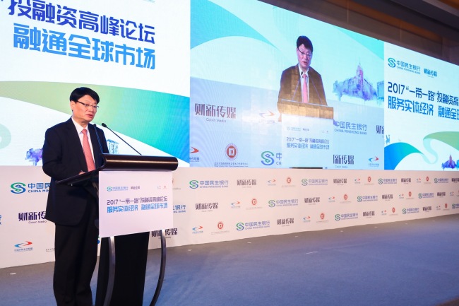 Hong Qi, chairman of China Minsheng Bank, speaks during Belt and Road Investing and Financing Forum in Beijing, on Nov. 30, 2017. [Photo provided to China Plus]