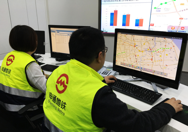 Staff working at the Shanghai Shentong Metro Group, November 27, 2017. [Photo: China Plus/Meng Xue]