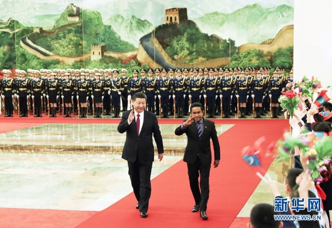 Chinese President Xi Jinping (left) holds a welcoming ceremony for Maldives President Abdulla Yameen Abdul Gayoom in Beijing, on Dec. 7, 2017. [Photo: Xinhua]