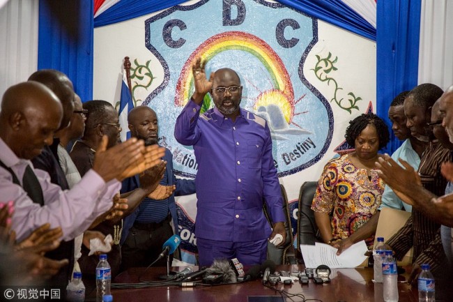 George Weah, President of Liberia, attends a press conference at the Coalition for Democratic Change (CDC) Party's headquarters in Monrovia, Liberia on 30 December 2017. [Photo: VCG]