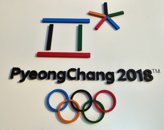The emblem of the 2018 PyeongChang Winter Olympics, with a capital "C", is seen on an advertisement board outside the city hall in Seoul on January 26, 2016. With a one letter shift from lower to upper case, the South Korean venue for the 2018 Winter Olympics, Pyeongchang, hopes to ensure visitors don't end up flying to the capital of North Korea by mistake. [Photo: IC]