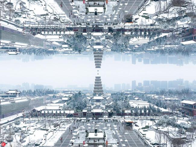 雪后西安“折叠”现奇幻大片 Photo artist provides unique perspective on snow-covered Xi'an