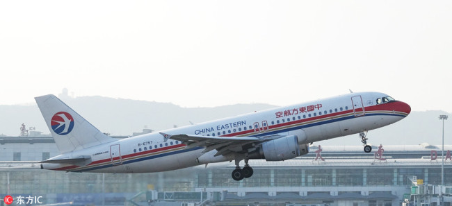 An Airbus A320 jet plane of China Eastern Airlines takes off at the Dalian Zhoushuizi International Airport in Dalian city, northeast China's Liaoning province, 3 December 2017. [Photo: IC]