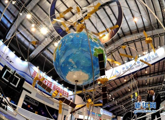 Undated photo shows a model of the BeiDou Satellite Navigation system on exhibition in Zhuhai, Guangdong Province. [File photo: Xinhua]
