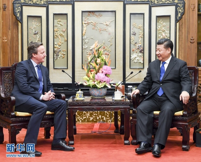 Chinese President Xi Jinping meets with former British Prime Minister David Cameron in Beijing on Thursday, January 11, 2018. [Photo: Xinhua]