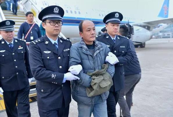 Zhou Jiyang, a former party official in Zhejiang Province, is the 50th returned fugitive from China's 100 most wanted list. [Photo: QNSB]