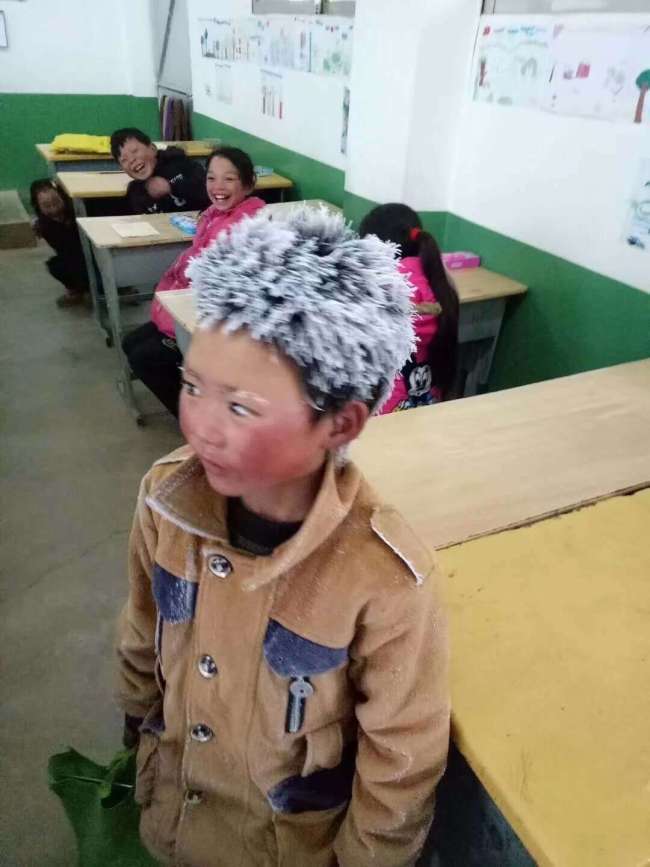 Wang Fuman arrived at school with frozen hair. [Photo: chinadaily.com.cn]