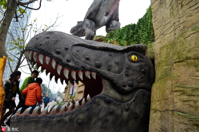 A dinosaur sculpture at a theme park in Chongqing [File photo: IC]
