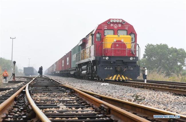 The freight train of China Railway Express (Xiamen-Budapest), linking southeast China's port city of Xiamen with Budapest, capital of Hungary, leaves Haicang Station in Xiamen, southeast China's Fujian Province, Jan. 19, 2018. The 11,595 km journey, which takes one stop at China's Xi'an, will take 18 days. [Photo: Xinhua]