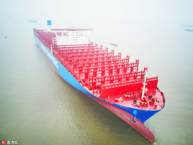 Aerial view of China's first 20,000 TEU container vessel "COSCO SHIPPING ARIES", also China's largest container ship manufactured by Nantong COSCO KHI Ship Engineering Co., Ltd. (NACKS), during its naming and delivery ceremony at the Port of Nantong in Nantong city, east China's Jiangsu province, 16 January 2018. [File photo: IC]