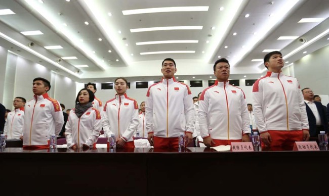 The Chinese delegation headed to the 2018 Winter Olympics in Pyongchang, South Korea has come together in Beijing, January 31, 2018. China is sending a delegation of 82 athletes and coaches to the games, with a shot at 55 medals in total. This marks the first time China will compete in the Bobsleigh and Skeleton events. [Photo: China Plus/ Li Jin]