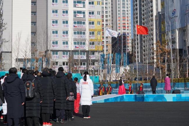 Chinese national flag is raised at the Gangneung Olympic Village on Wednesday, February 7, 2018. [Photo: China Plus]