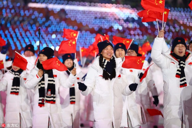 Athletes from China march into the stadium during the opening ceremony for the Pyeongchang 2018 Olympic Winter Games at Pyeongchang Olympic Stadium. [Photo: IC/USA TODAY Sports/ Rob Schumacher]
