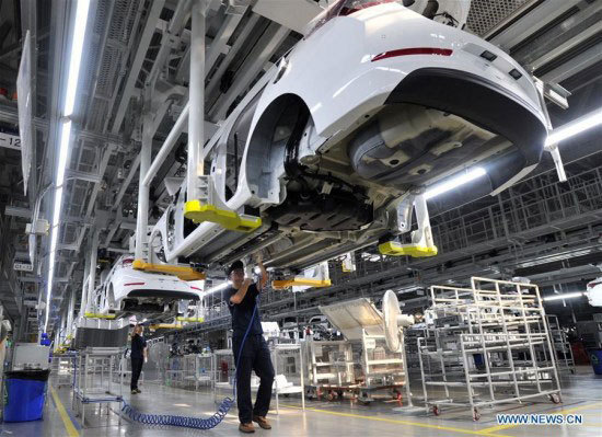 The file photo shows a car making factory. [Photo: Xinhua]