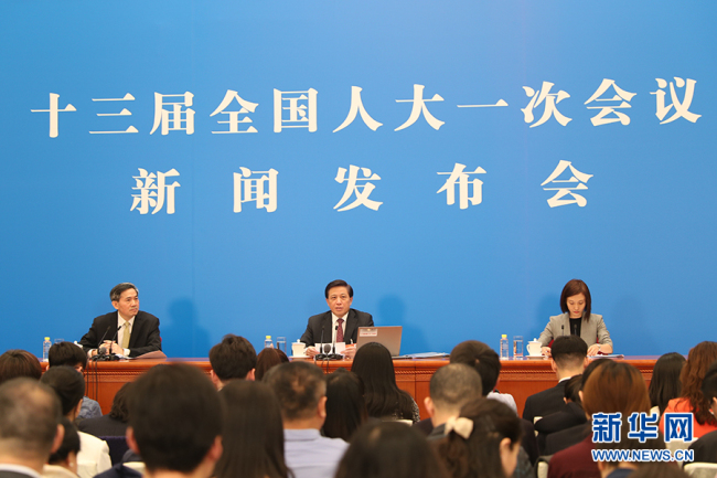 Zhang Yesui,spokesperson of the first session of the 13th National People's Congress (NPC), answers questions from the press at a news conference in Beijing on March 4, 2018. [Photo: Xinhua]