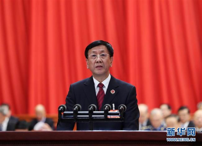 China’s Procurator-General Cao Jianming delivers a work report at a plenary meeting of the on-going first session of the 13th National People's Congress on March 9, 2018. [Photo: Xinhua]