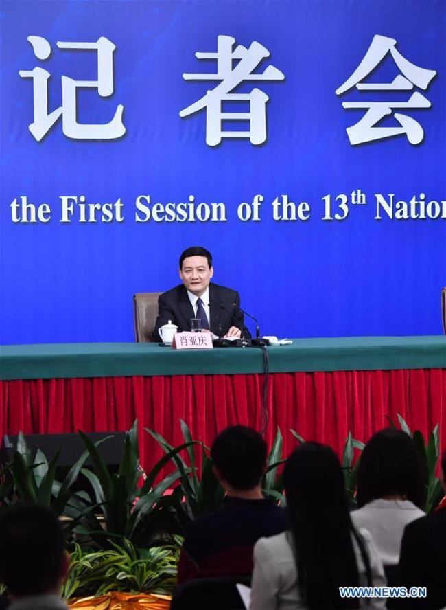 Xiao Yaqing, head of the State-owned Assets Supervision and Administration Commission (SASAC), answers questions at a press conference on reform and development of state-owned enterprises on the sidelines of the first session of the 13th National People's Congress in Beijing, capital of China, March 10, 2018. [Photo: Xinhua]