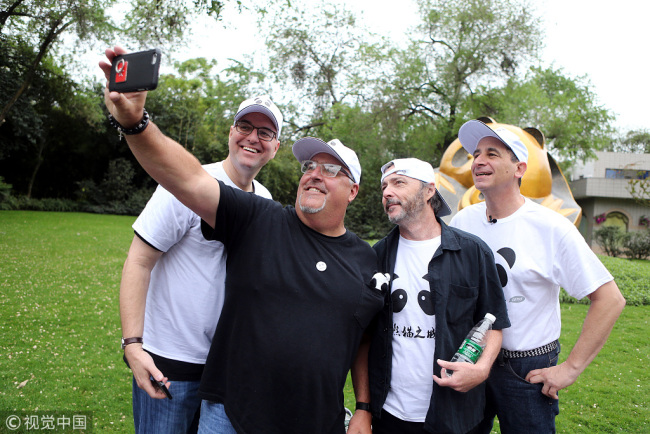 A group of Hollywood filmmakers take selfie in Chengdu, Sichuan Province, April 20, 2017, when they participate in an activity named "Hollywood Masters' China Trip." [Photo: VCG]