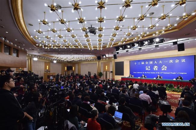 A press conference on reform and development of state-owned enterprises is held on the sidelines of the first session of the 13th National People's Congress in Beijing on March 10, 2018. [Photo: Xinhua/Li Xin]
