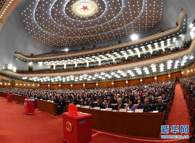 The third plenary meeting of the first session of the 13th National People's Congress opens at the Great Hall of the People in Beijing on March 11, 2018. [Photo: Xinhua]
