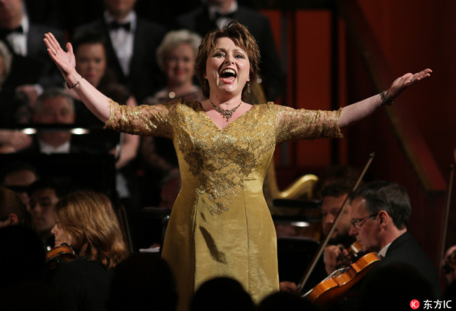 Soprano Rebecca Evans sings as the Prince of Wales attends a 70th anniversary gala concert for Welsh National Opera conducted by Carlo Rizzi at the Buckingham Palace, London.