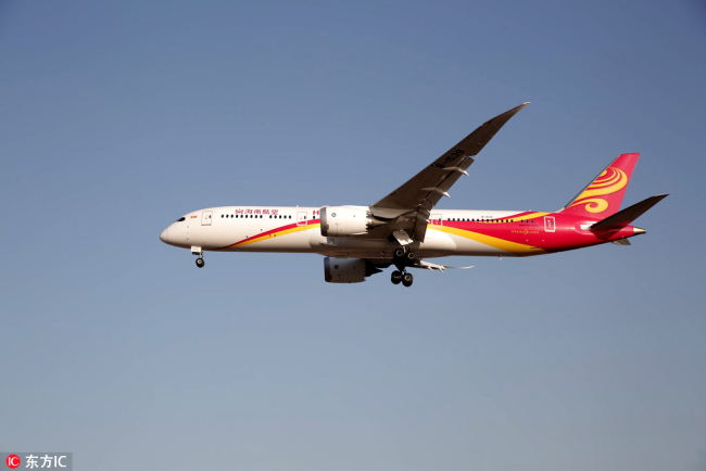 A jet plane of Hainan Airlines is pictured at the Beijing Capital International Airport in Beijing on January 19, 2018. [File Photo: IC]