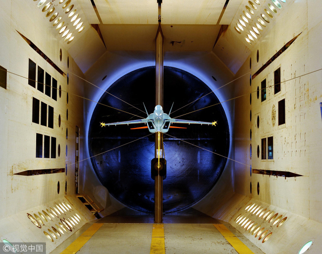 A plane model undergoes tests in a wind tunnel. [File Photo: VCG]