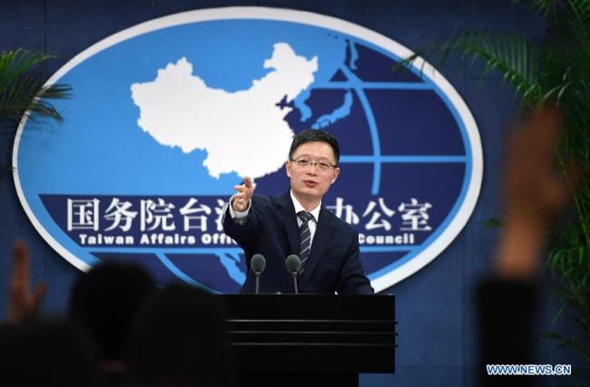 An Fengshan, spokesperson for the State Council Taiwan Affairs Office, gestures at a regular press conference in Beijing, capital of China, Feb. 22, 2017.[Photo: Xinhua]