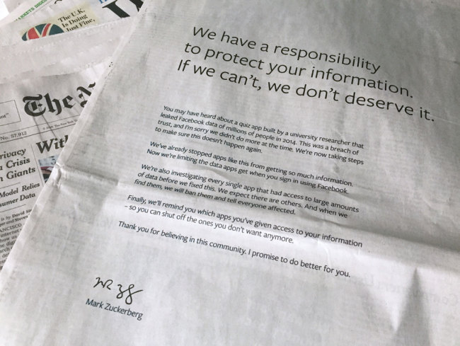 An advertisement in The New York Times is displayed on Sunday, March 25, 2018, in New York. Facebook’s CEO apologized for the Cambridge Analytica scandal with ads in multiple U.S. and British newspapers Sunday. [Photo: AP]
