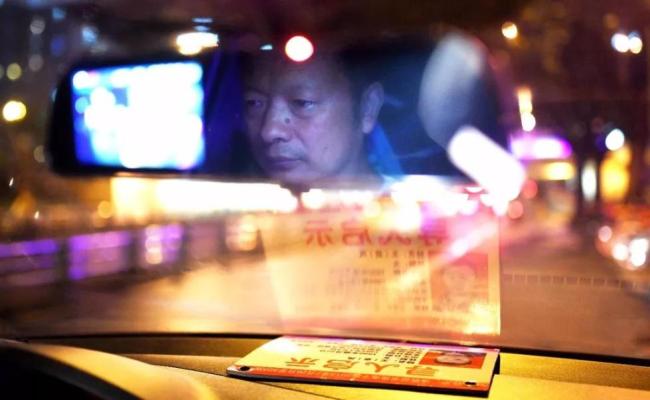 Wang Mingqing, a driver of a ride-sharing company in Chengdu, Sichuan Province, who had been looking for his missing daughter for 24 years. [File Photo: Xinhua]