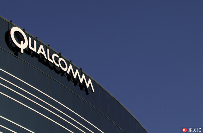 A sign sits atop the Qualcomm headquarters building in San Diego. [File Photo: IC]