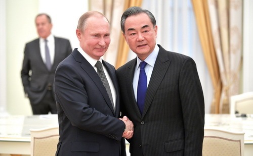 Visiting Chinese Foreign Minister Wang Yi meets with Russian President Vladimir Putin in Moscow on Thursday April 5. [Photo:  fmprc.gov.cn] 