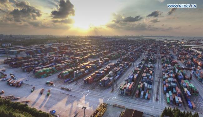 Aerial photo taken on Sept. 19, 2015 shows the Waigaoqiao container pier of the Shanghai free trade zone in Shanghai, east China. [Photo: Xinhua]