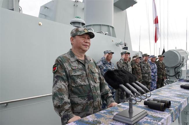 Chinese President Xi Jinping, also general secretary of the Communist Party of China Central Committee and chairman of the Central Military Commission, reviews the Chinese People's Liberation Army (PLA) Navy in the South China Sea on April 12, 2018. Xi made a speech after the review.[Photo: Xinhua]