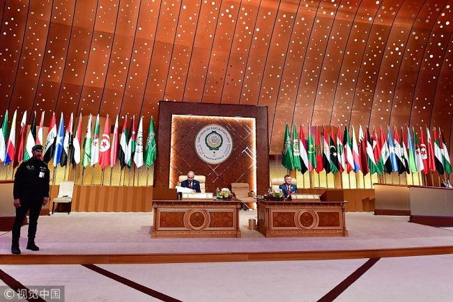 Arab League Secretary-General Ahmed Aboul Gheit (C-L) and King Abdullah II of Jordan (R) attend the 29th Summit of the Arab League at the Ithra center in Dhahran, Eastern Saudi Arabia, on April 15, 2018. [Photo: VCG]