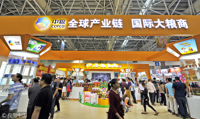 Products of China National Cereals, Oils and Foodstuffs Corporation (COFCO) are on display at a trade fair in Fuzhou, Fujian Province. [File photo: VCG]
